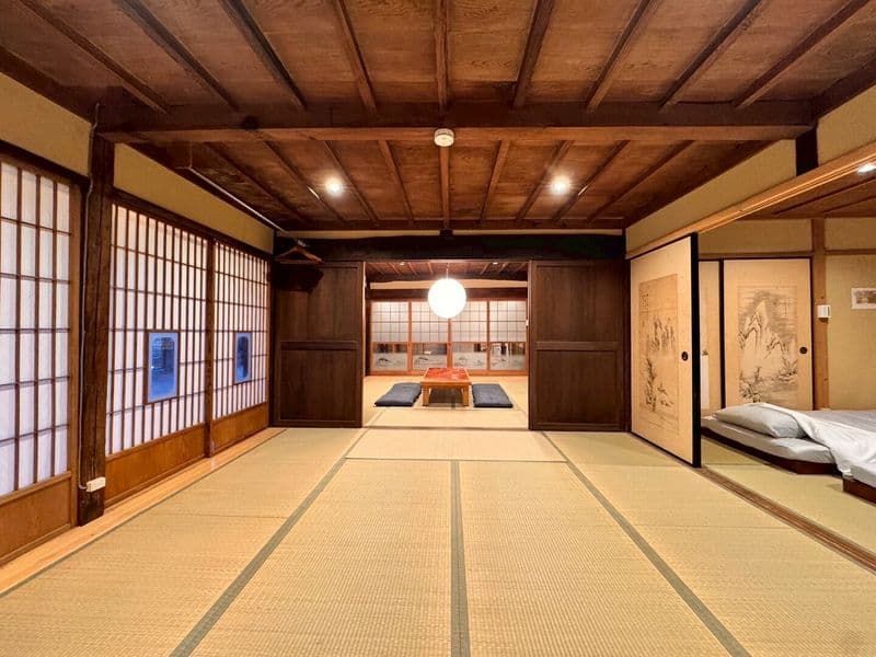 Adjoining tatami rooms with a low table and floor cushions